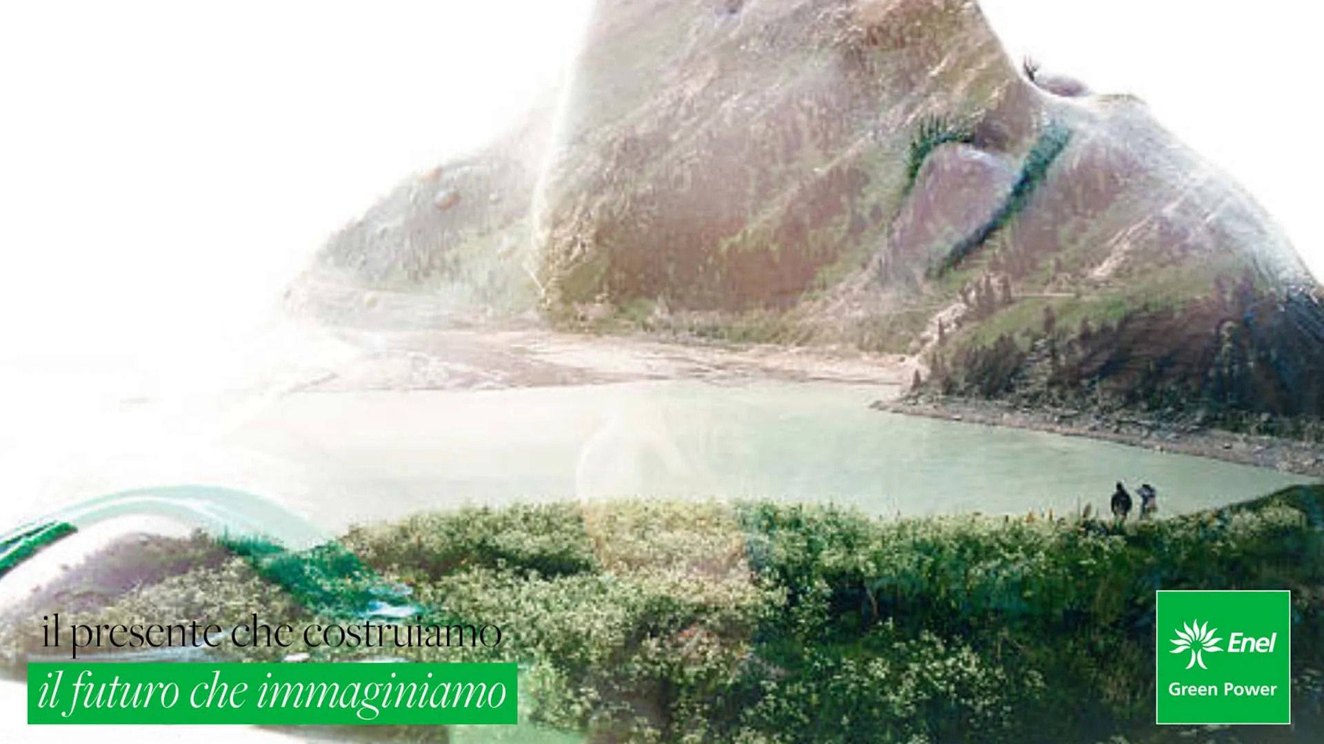 Un paesaggio di montagna con un lago e prati verdi che disegna un profilo di volto, con la frase il presente che costruiamo, il futuro che immaginiamo e il marchio Enel Green Power